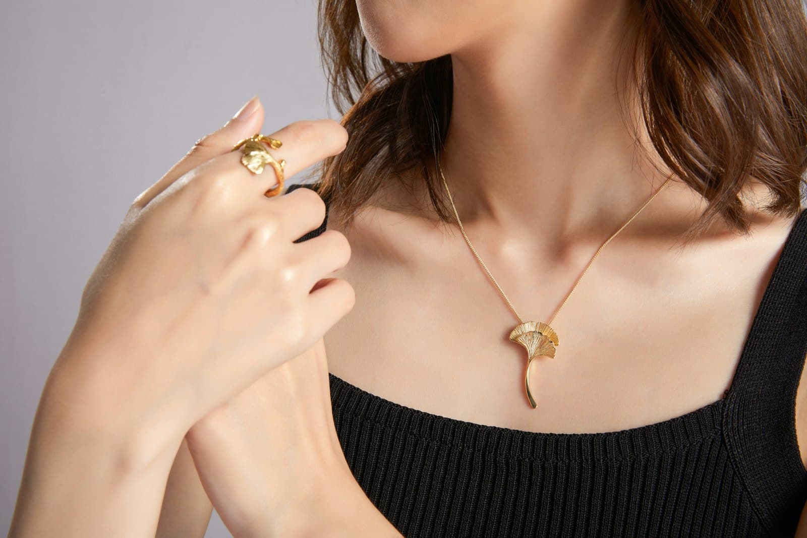 Pendant worn by a customer