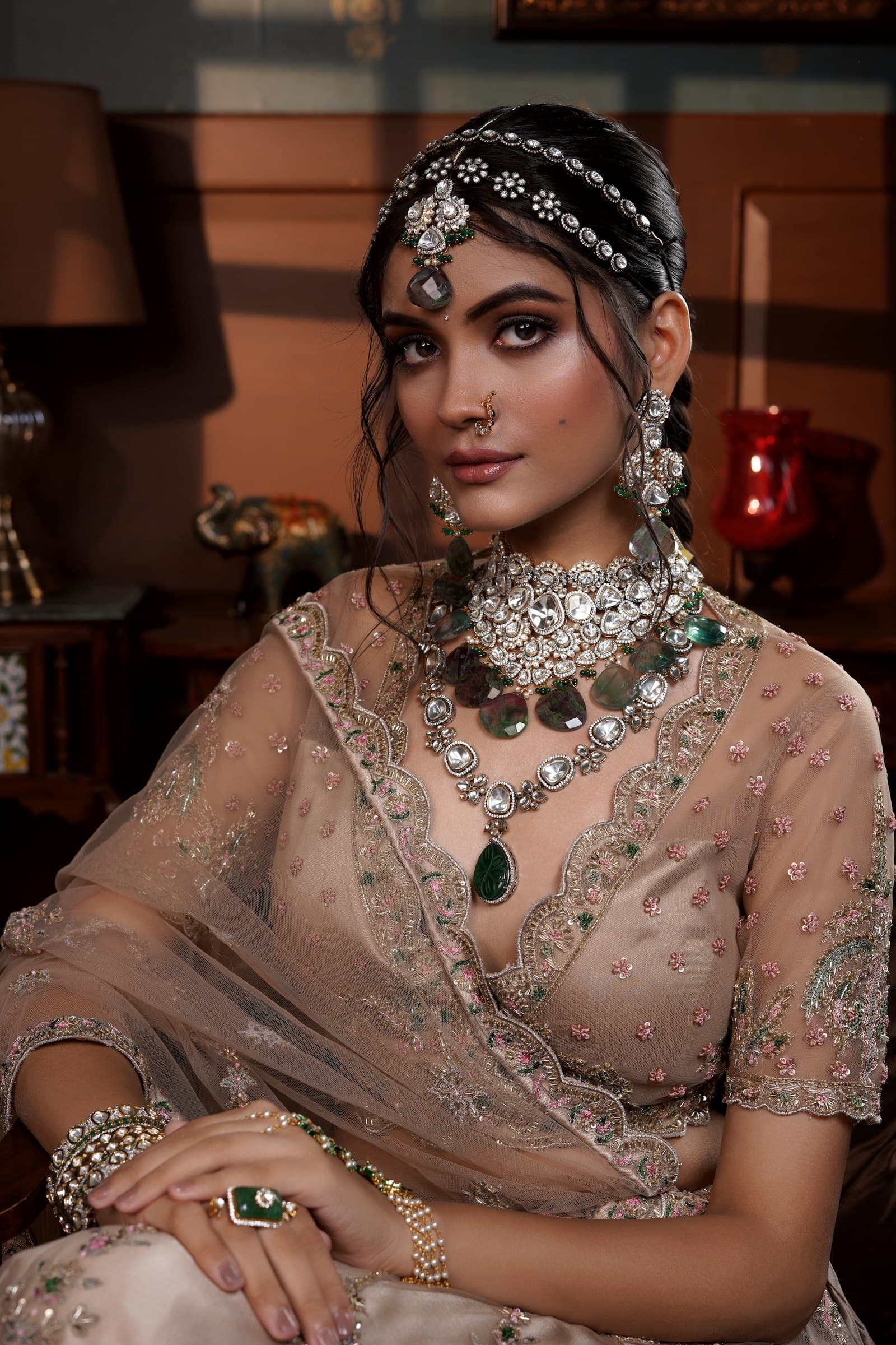 Customer wearing a bridal jewellery set from Nakshatra Jewellers